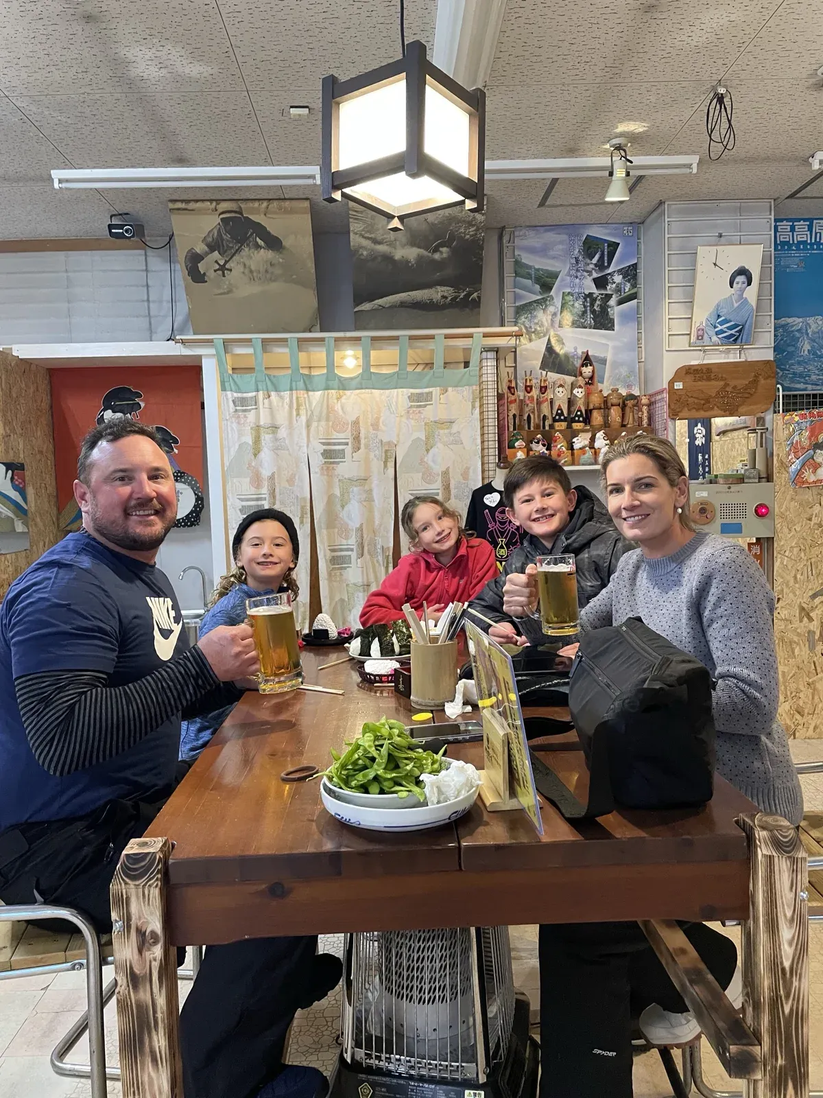 A family sharing a meal at NINJA